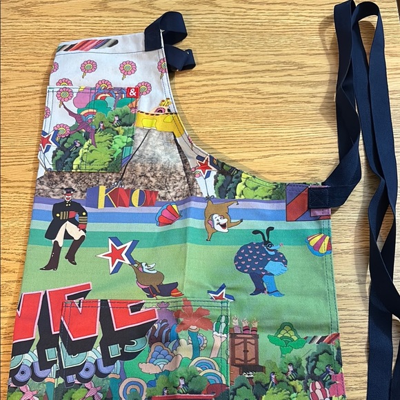 Hedley&Bennett Apron
The Beatles Blue and Green Artistic Illustration. - Picture 2 of 5